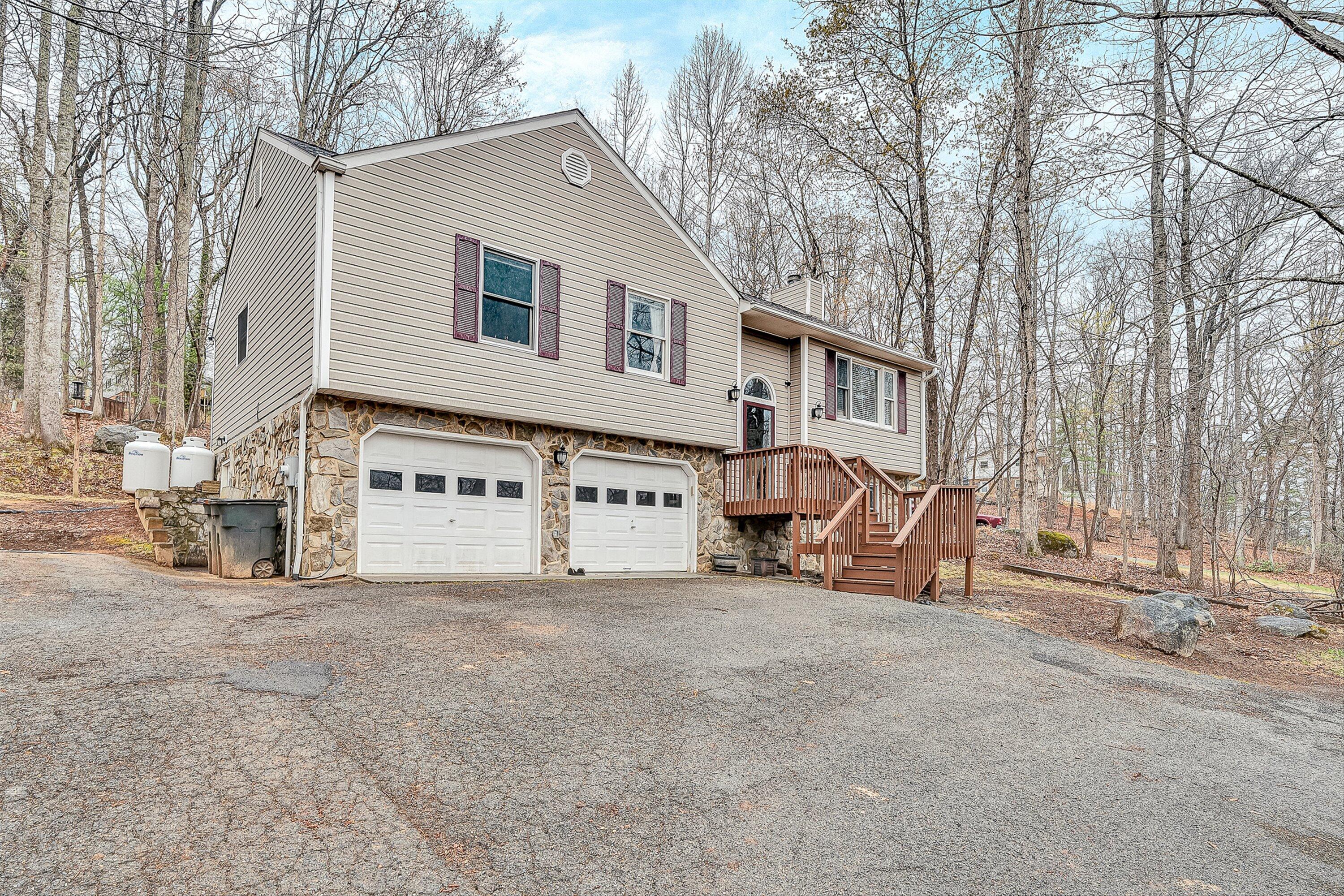 769 Lakeshore Terrace Road Hardy, VA 24101 - Photo 2 of 38 a view of a house with backyard and sitting area