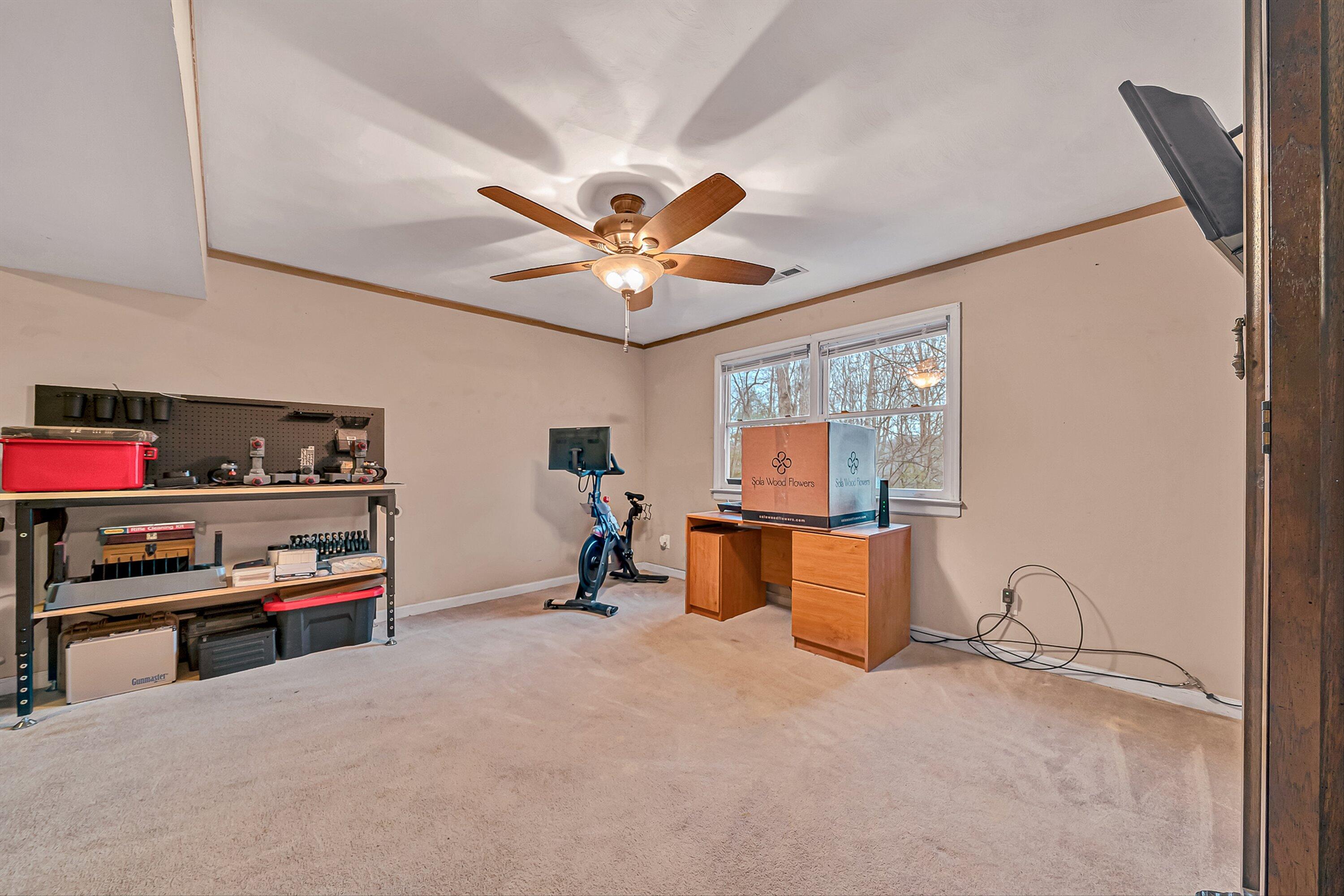 769 Lakeshore Terrace Road Hardy, VA 24101 - Photo 21 of 38 a bedroom with furniture and a large window