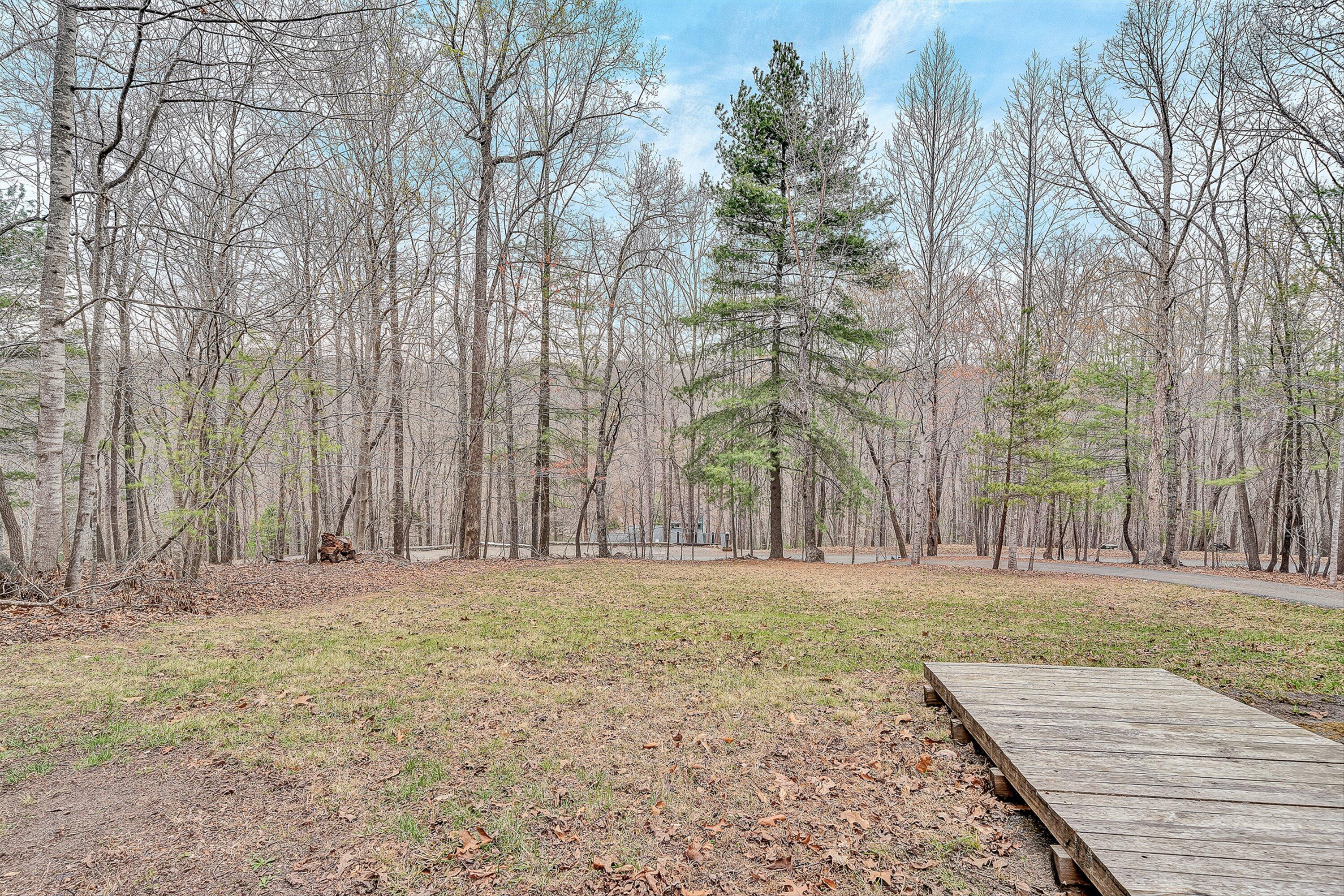 769 Lakeshore Terrace Road Hardy, VA 24101 - Photo 37 of 38 a front view of a house with a yard