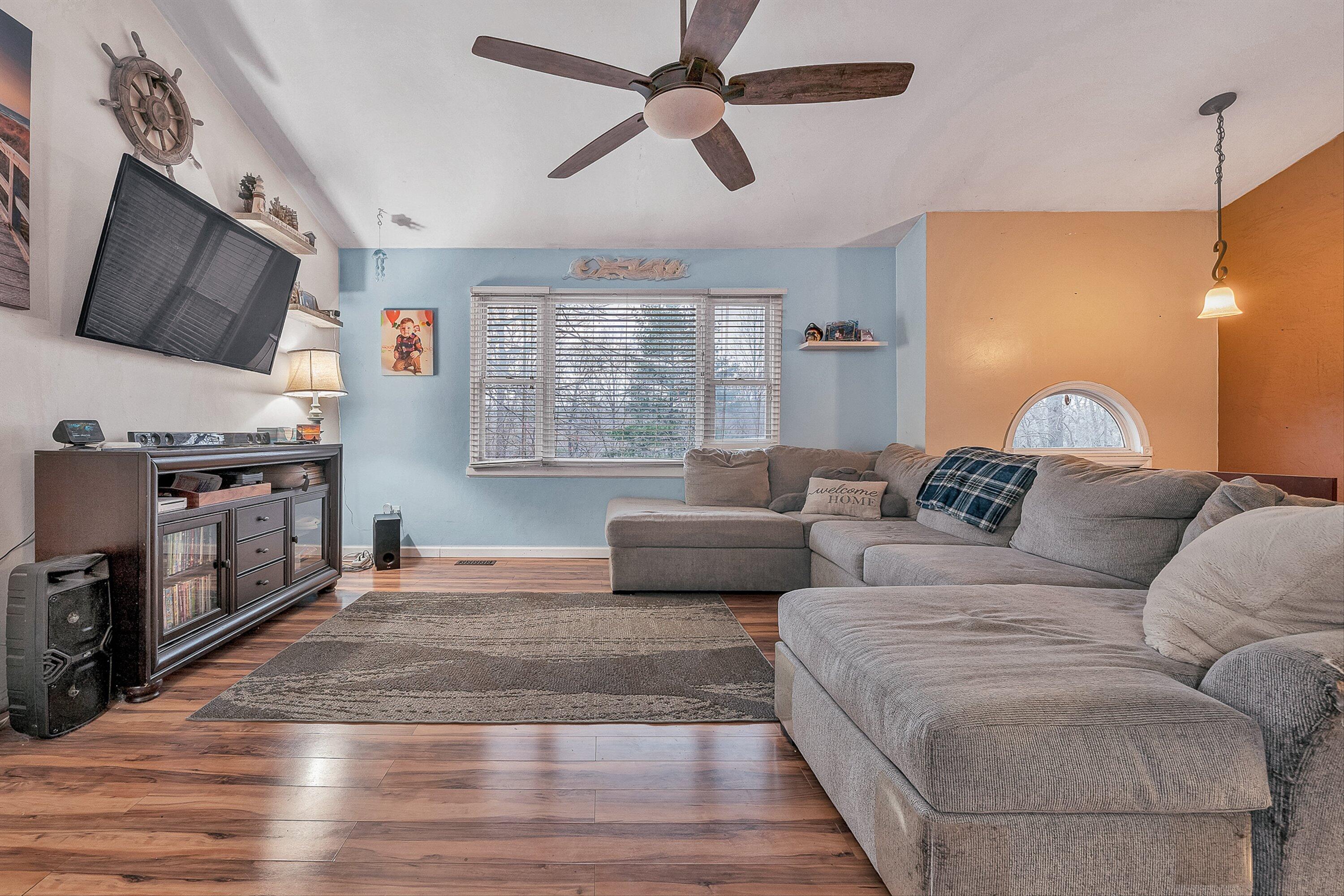 769 Lakeshore Terrace Road Hardy, VA 24101 - Photo 6 of 38 a living room with furniture and a flat screen tv