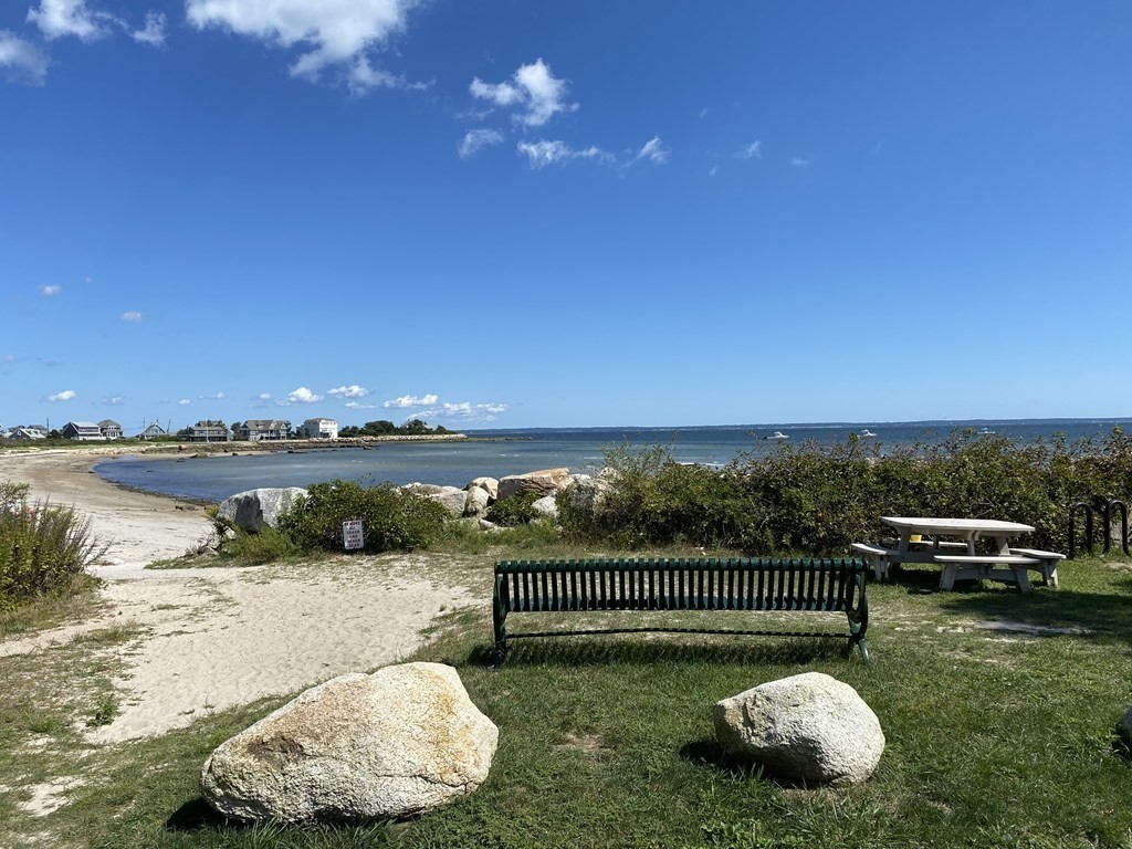 3 Beach Road Mattapoisett, MA 02739 - Photo 2 of 25 a view of a swimming pool with a patio and a yard