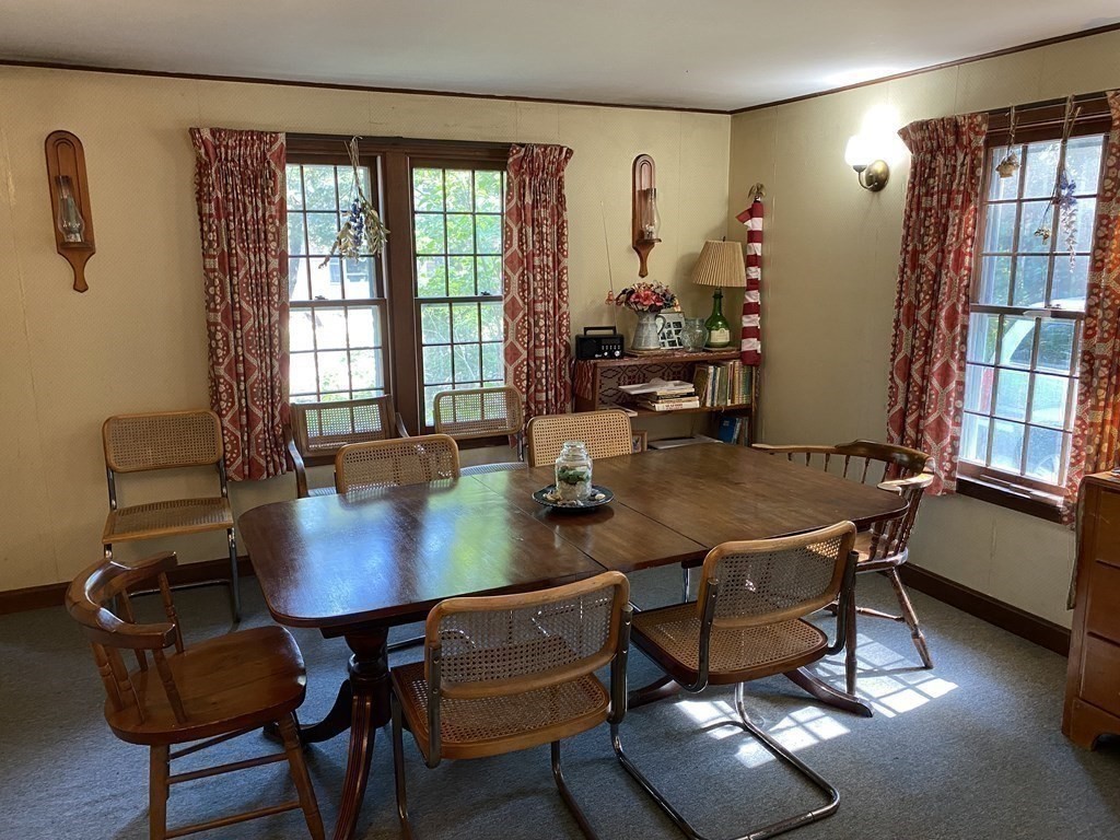 3 Beach Road Mattapoisett, MA 02739 - Photo 9 of 25 a dining room with furniture and window