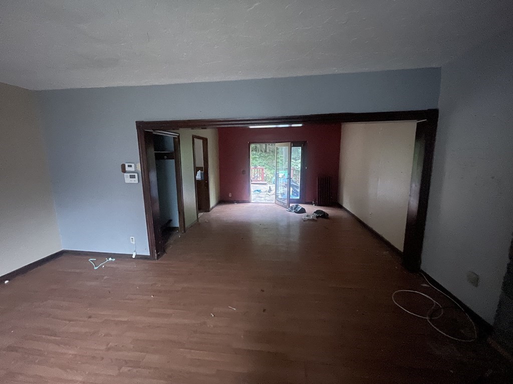 22 Taunton Street Worcester, MA 01604 - Photo 2 of 6 an empty room with windows