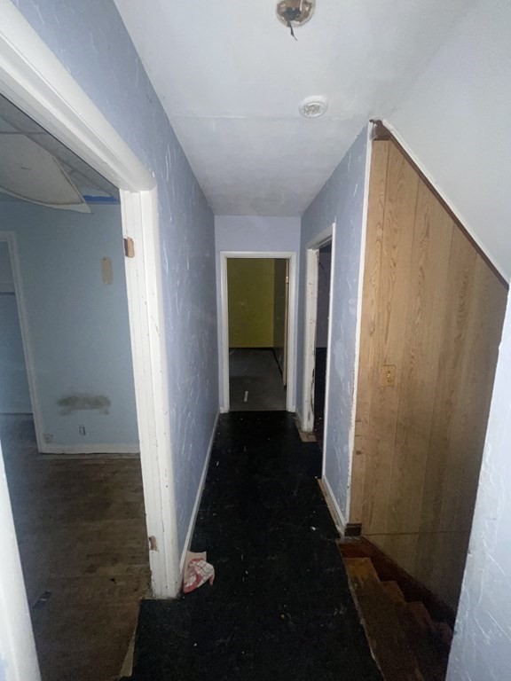 22 Taunton Street Worcester, MA 01604 - Photo 6 of 6 a view of a hallway with wooden shelves