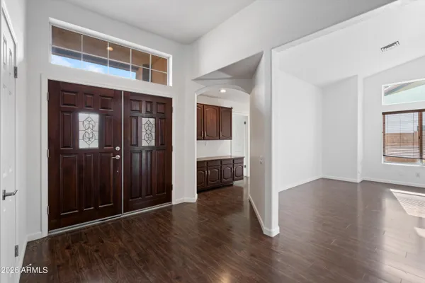an entryway at livingroom with furniture and wooden floor