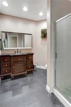 a room with a dresser and a mirror