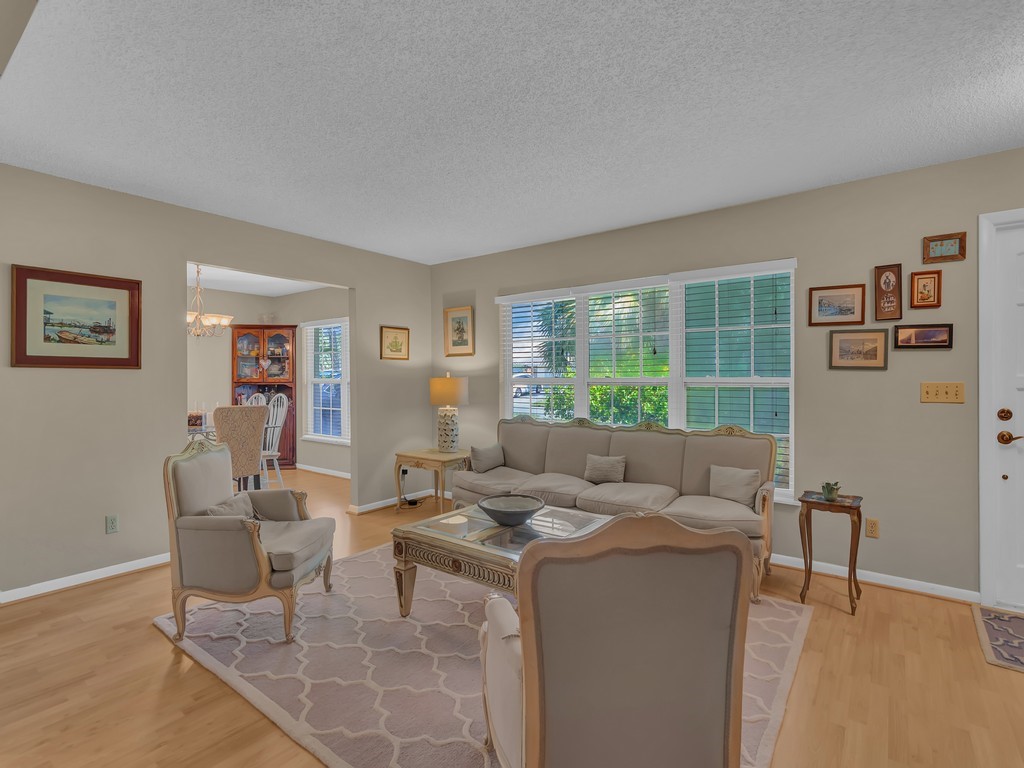1045 Clipper Road Vero Beach, FL 32963 - Photo 7 of 36 a living room with furniture and a window
