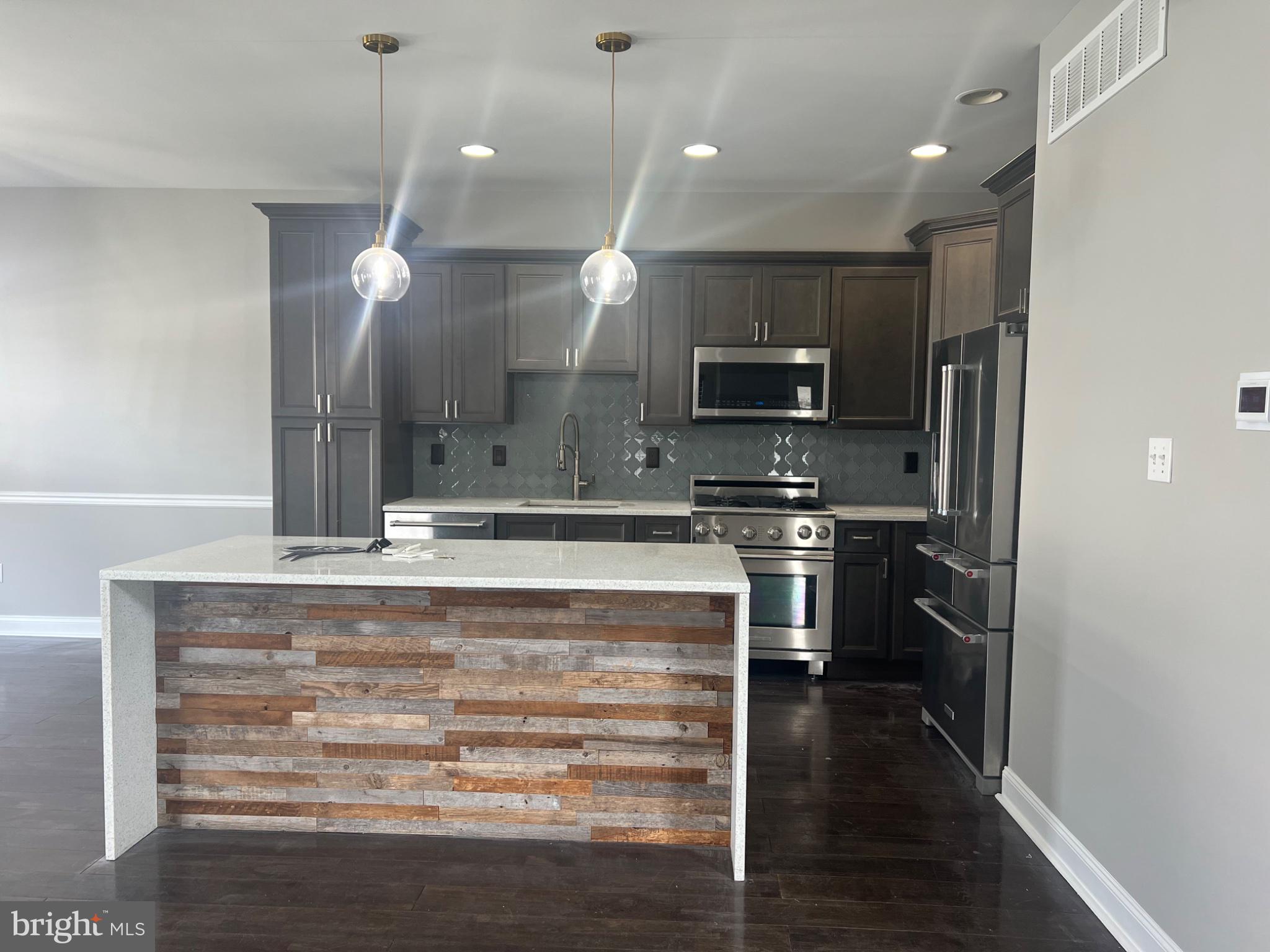 18 Bryce Road Berlin, NJ 08009 - Photo 5 of 31 Sleek modern kitchen with stylish finishes.