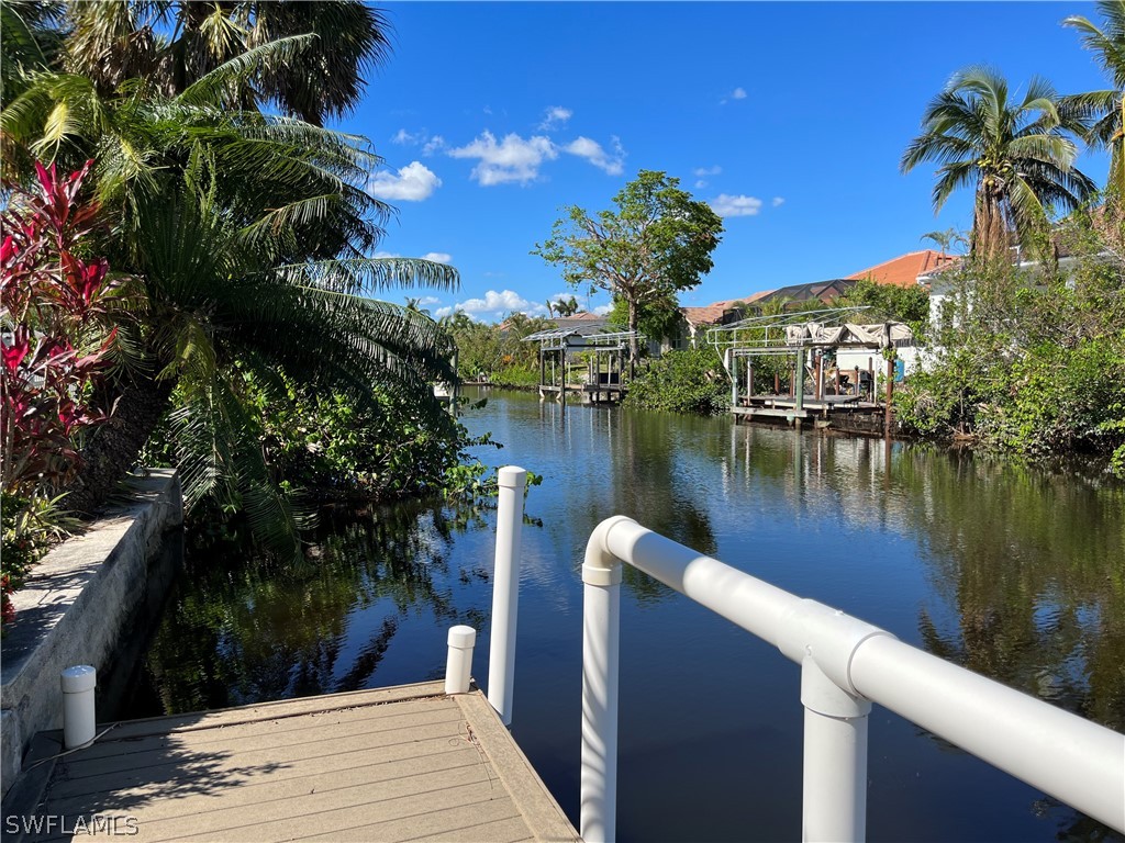 5650 Park Road Fort Myers, FL 33908 - Photo 13 of 15 a view of a lake with a building in front of it