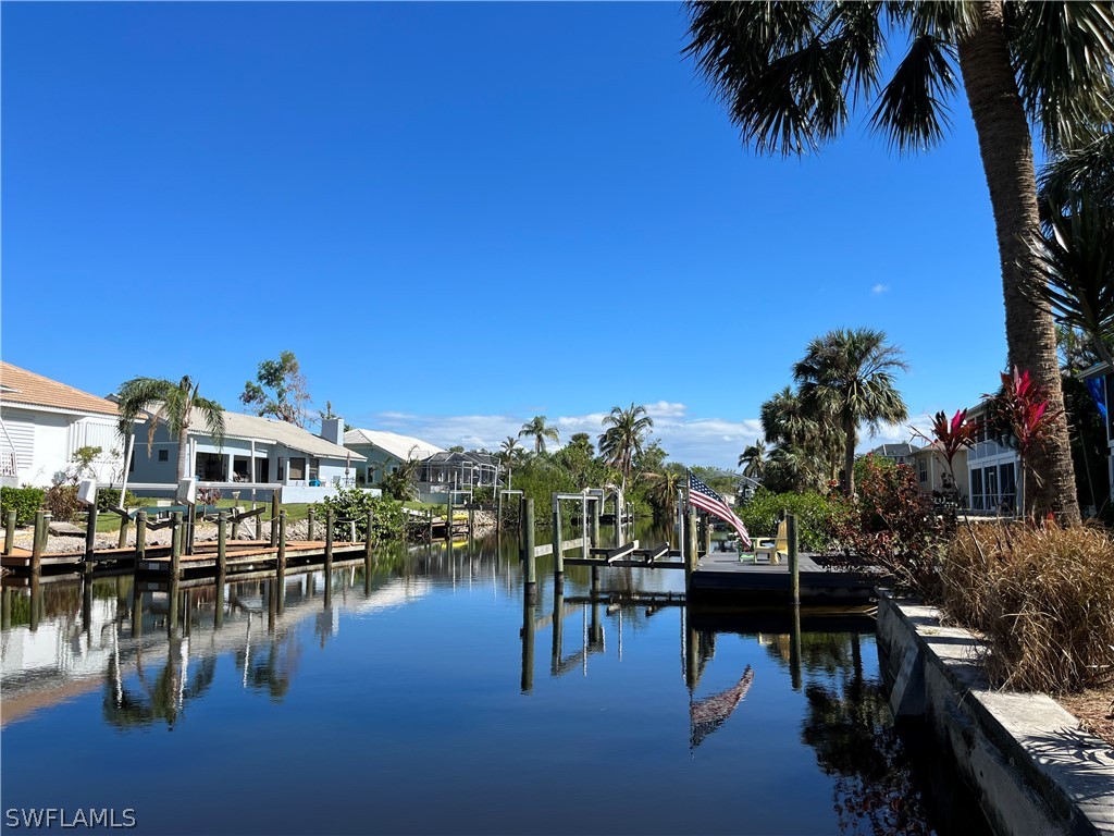 5650 Park Road Fort Myers, FL 33908 - Photo 15 of 15 a view of residential houses with outdoor space and lake view