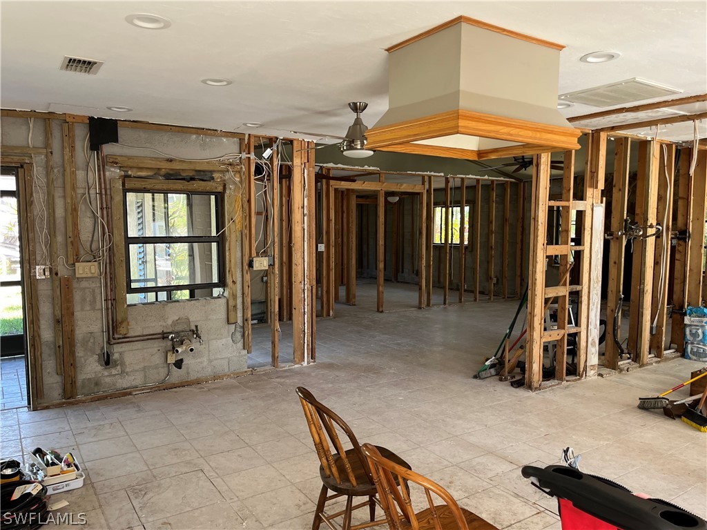 5650 Park Road Fort Myers, FL 33908 - Photo 2 of 15 a view of a patio with table and chairs
