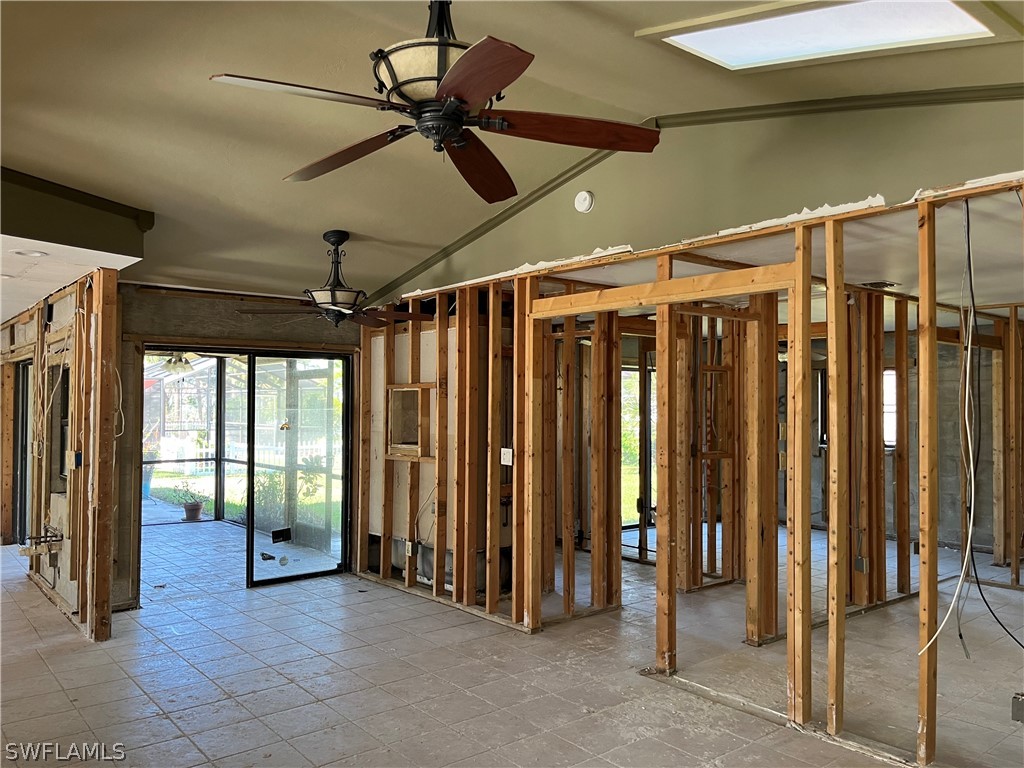 5650 Park Road Fort Myers, FL 33908 - Photo 5 of 15 a view of a hallway with wooden walls