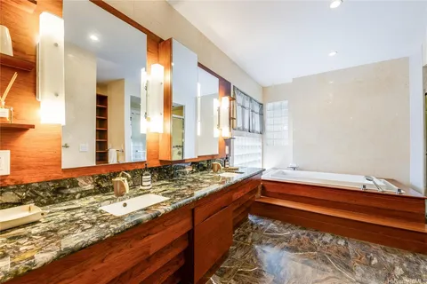 a view of front door with wooden floor