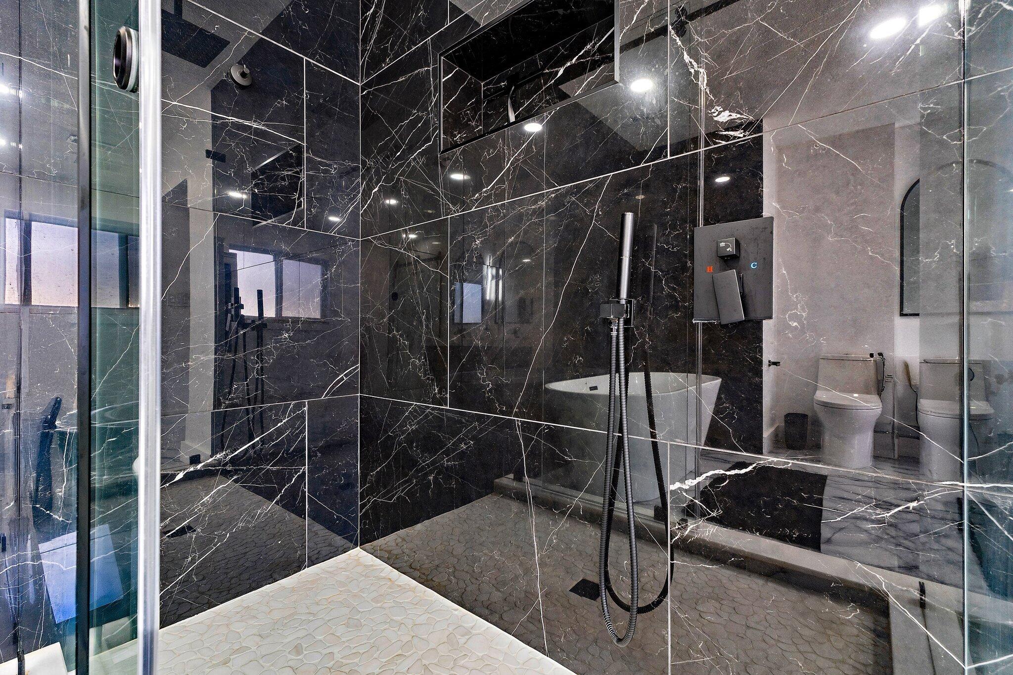 1851 Southeast Jackson Street Stuart, FL 34997 - Photo 33 of 61 a bathroom with shower