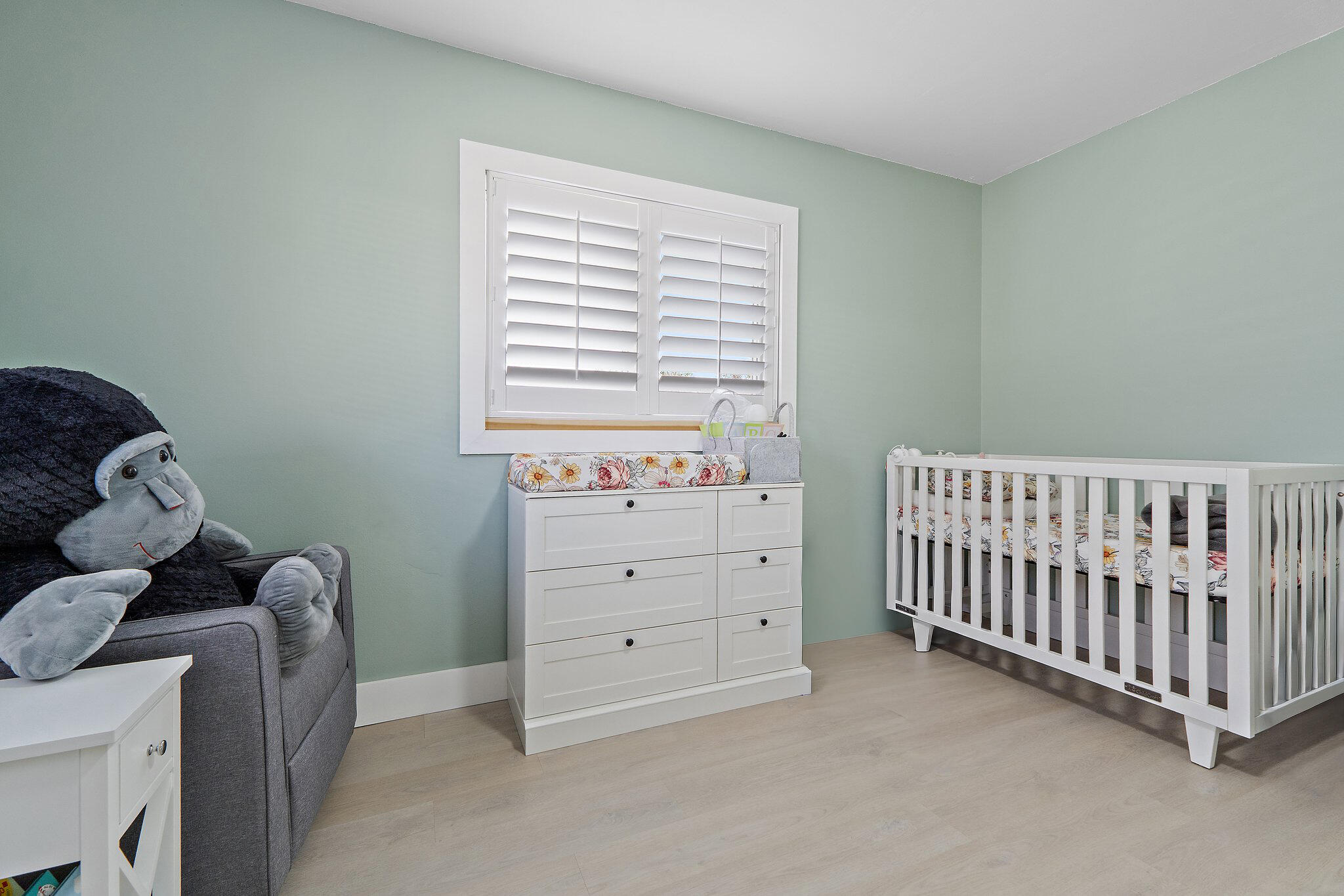 1851 Southeast Jackson Street Stuart, FL 34997 - Photo 38 of 61 a view of a bedroom with baby crib