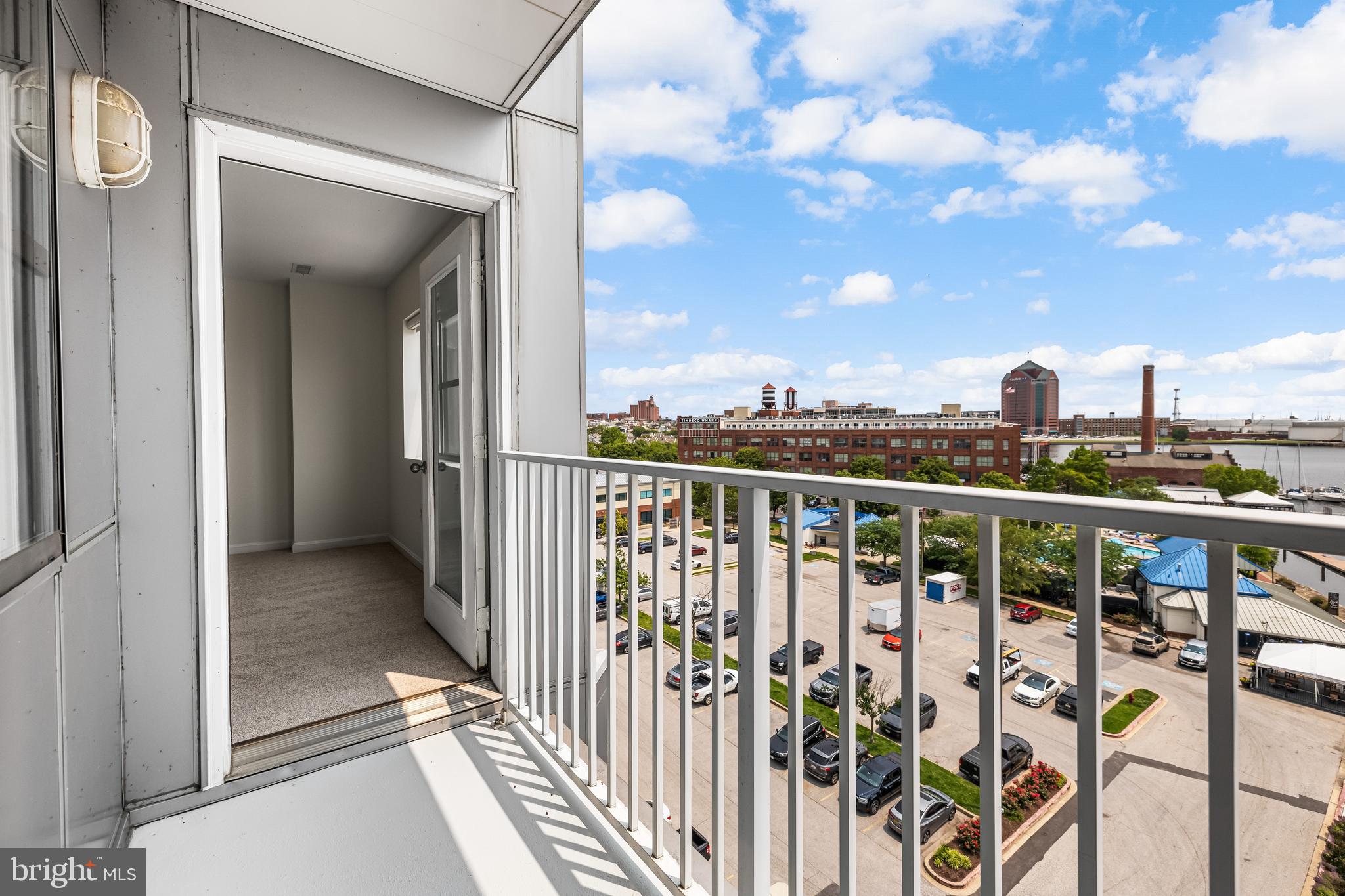 2702 Lighthouse Point East, Unit 638 Baltimore, MD 21224 - Photo 30 of 72 a view of a balcony with city view