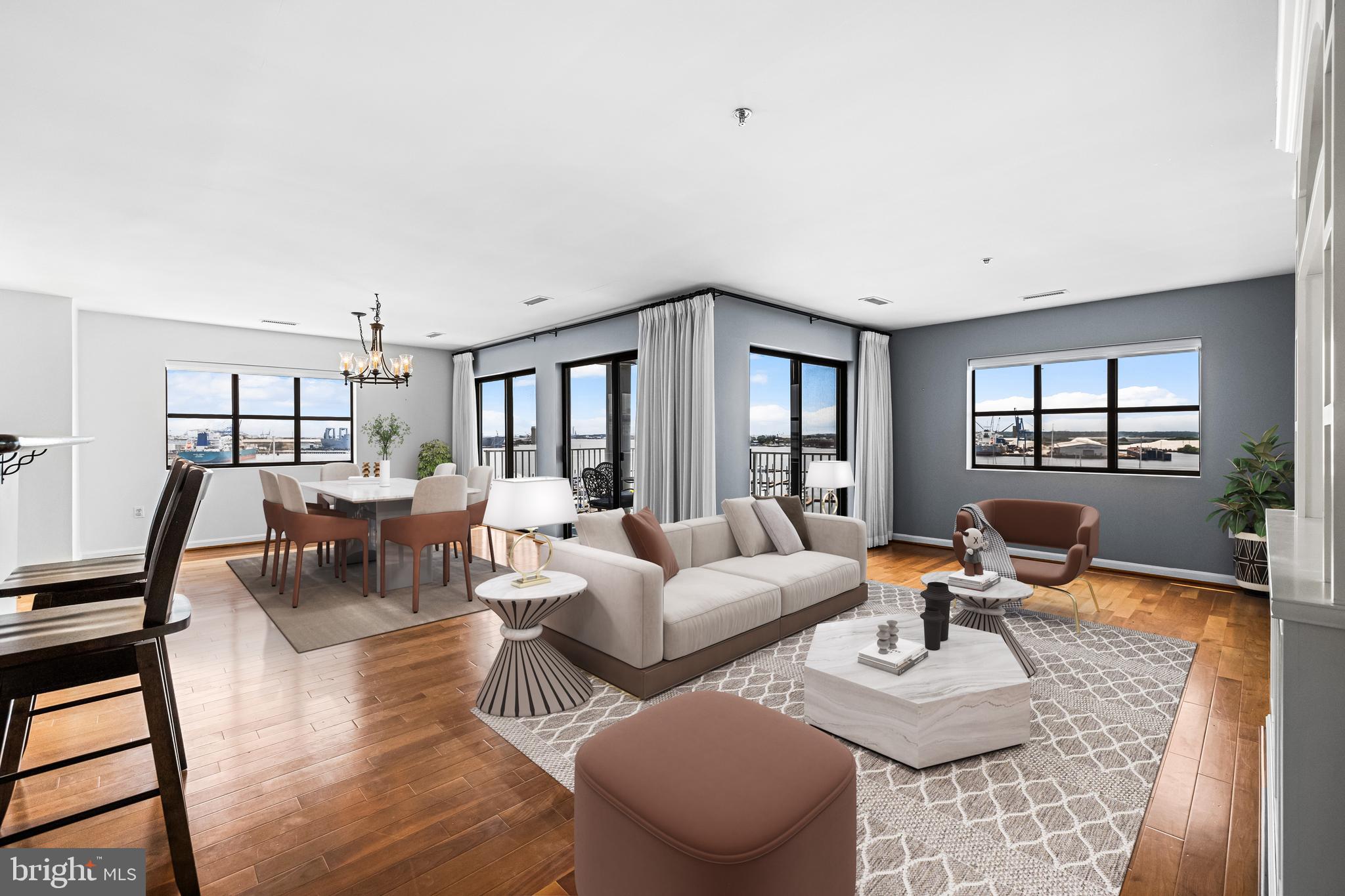 2702 Lighthouse Point East, Unit 638 Baltimore, MD 21224 - Photo 6 of 72 Virtually staged living and dining room areas