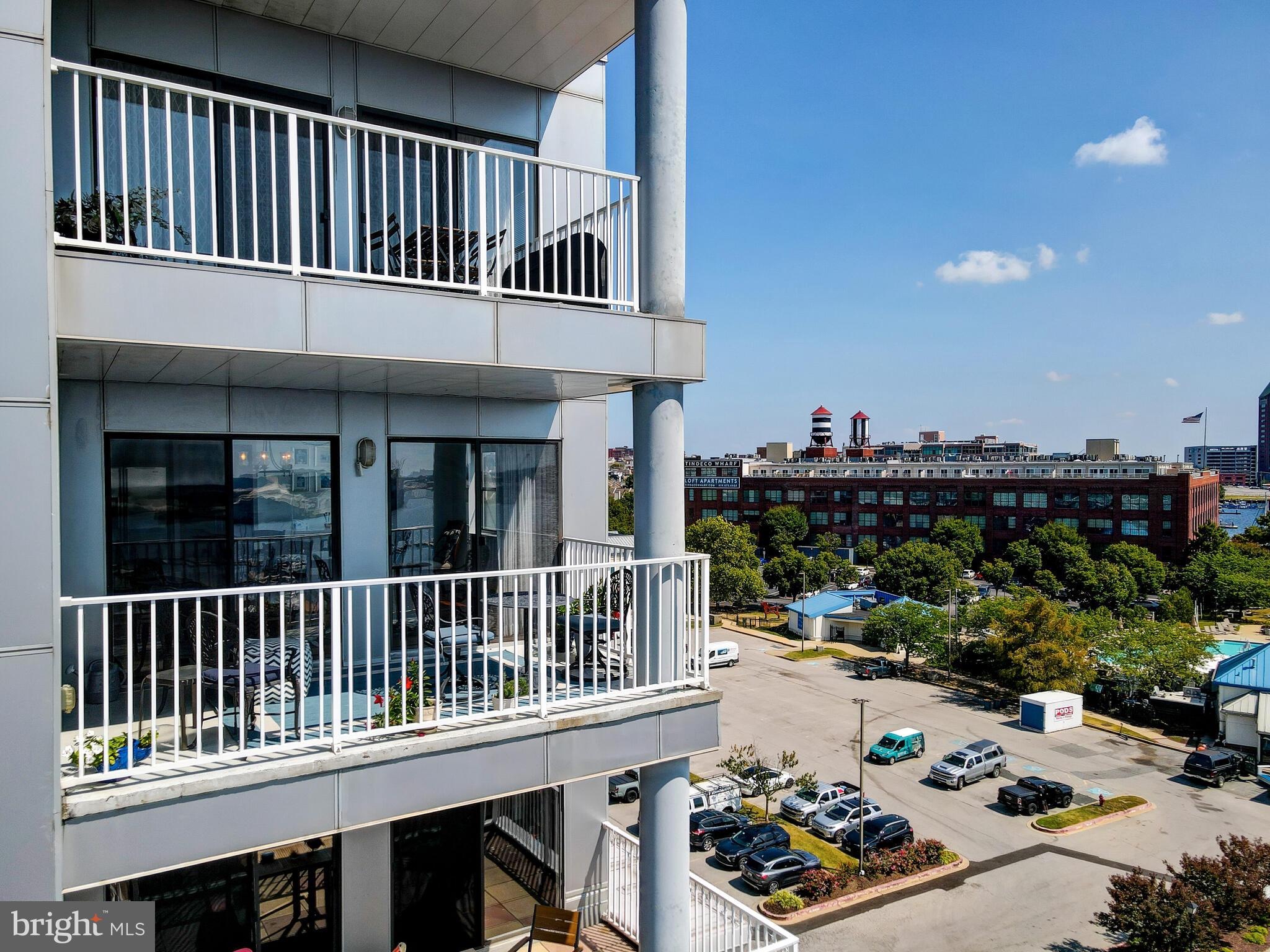 2702 Lighthouse Point East, Unit 638 Baltimore, MD 21224 - Photo 62 of 72 a view of a house with a deck