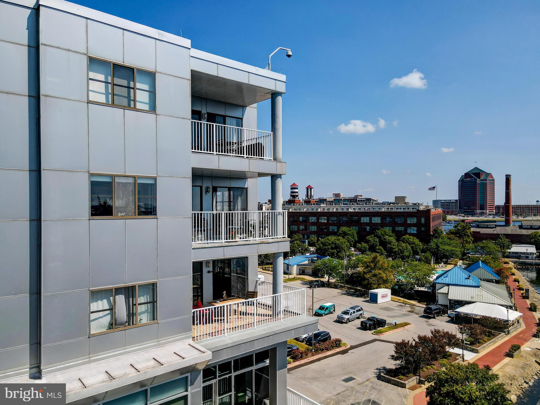 2702 Lighthouse Point East, Unit 638 Baltimore, MD 21224 - Photo 63 of 72 a view of a building with balcony