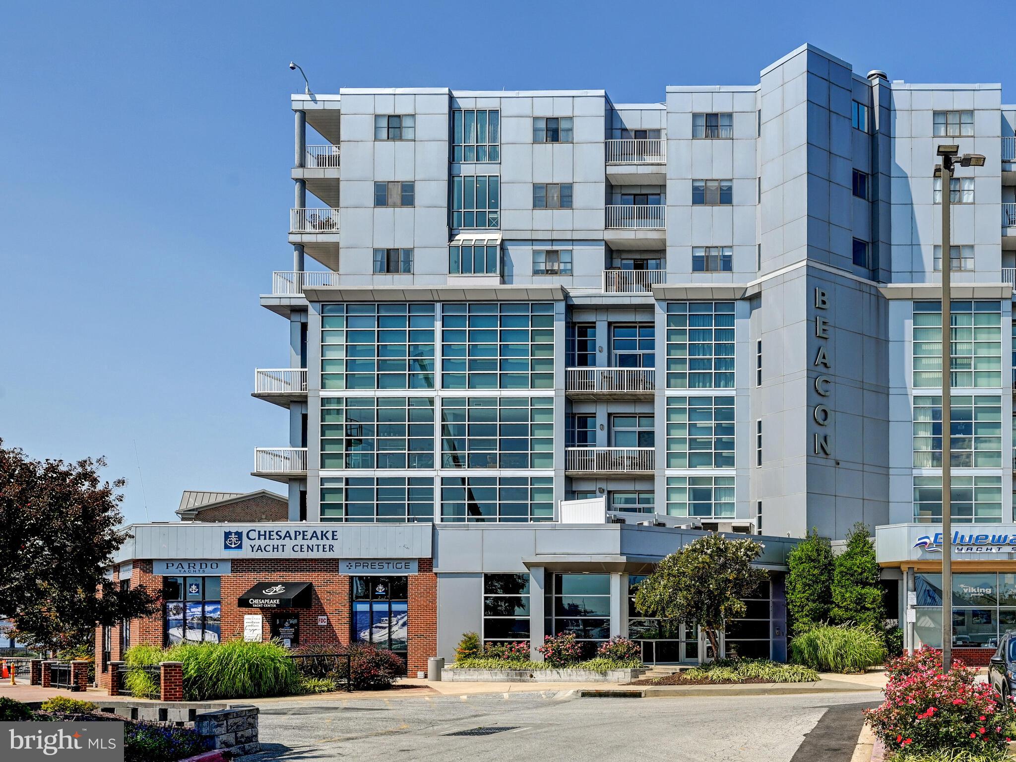 2702 Lighthouse Point East, Unit 638 Baltimore, MD 21224 - Photo 64 of 72 a front view of a building with street view