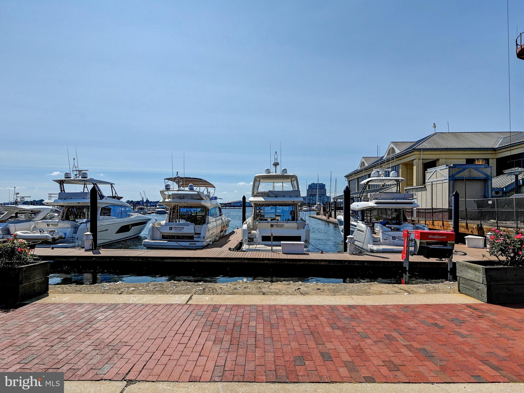 2702 Lighthouse Point East, Unit 638 Baltimore, MD 21224 - Photo 70 of 72 a view of car parked in the parking