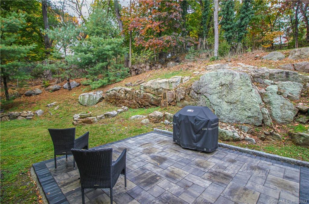 130 Post Road West, Unit PH Westport, CT 06880 - Photo 17 of 21 a view of a backyard with furniture