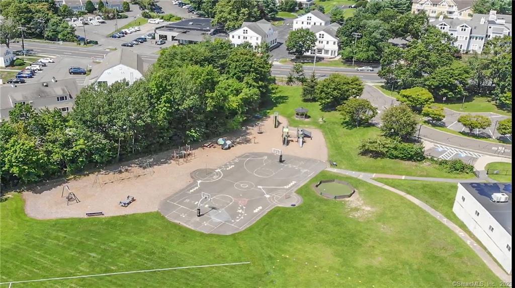 130 Post Road West, Unit PH Westport, CT 06880 - Photo 19 of 21 a view of a wooden table with chairs
