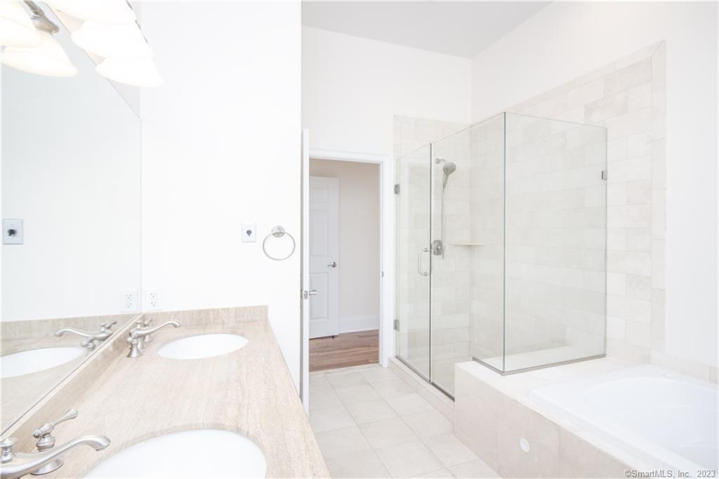 130 Post Road West, Unit PH Westport, CT 06880 - Photo 9 of 21 a bathroom with a sink toilet and shower