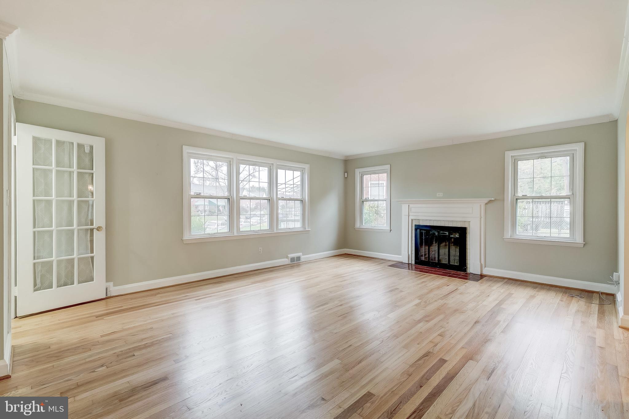 1912 Edgewood Road Baltimore, MD 21286 - Photo 8 of 45 Living room with refinished floors