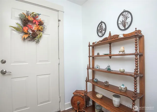 a view of a hallway with shelf