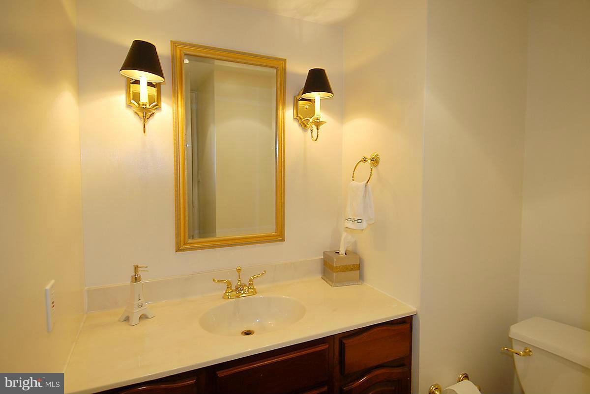 1077 30th Street Northwest, Unit 201 Washington, DC 20007 - Photo 12 of 16 Half bath