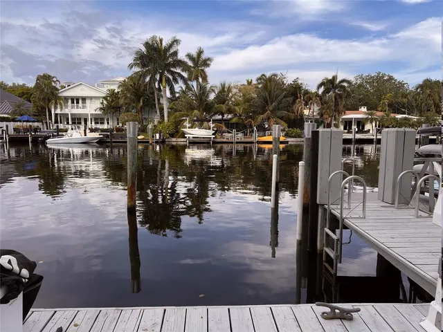 a terrace with outdoor seating and city view