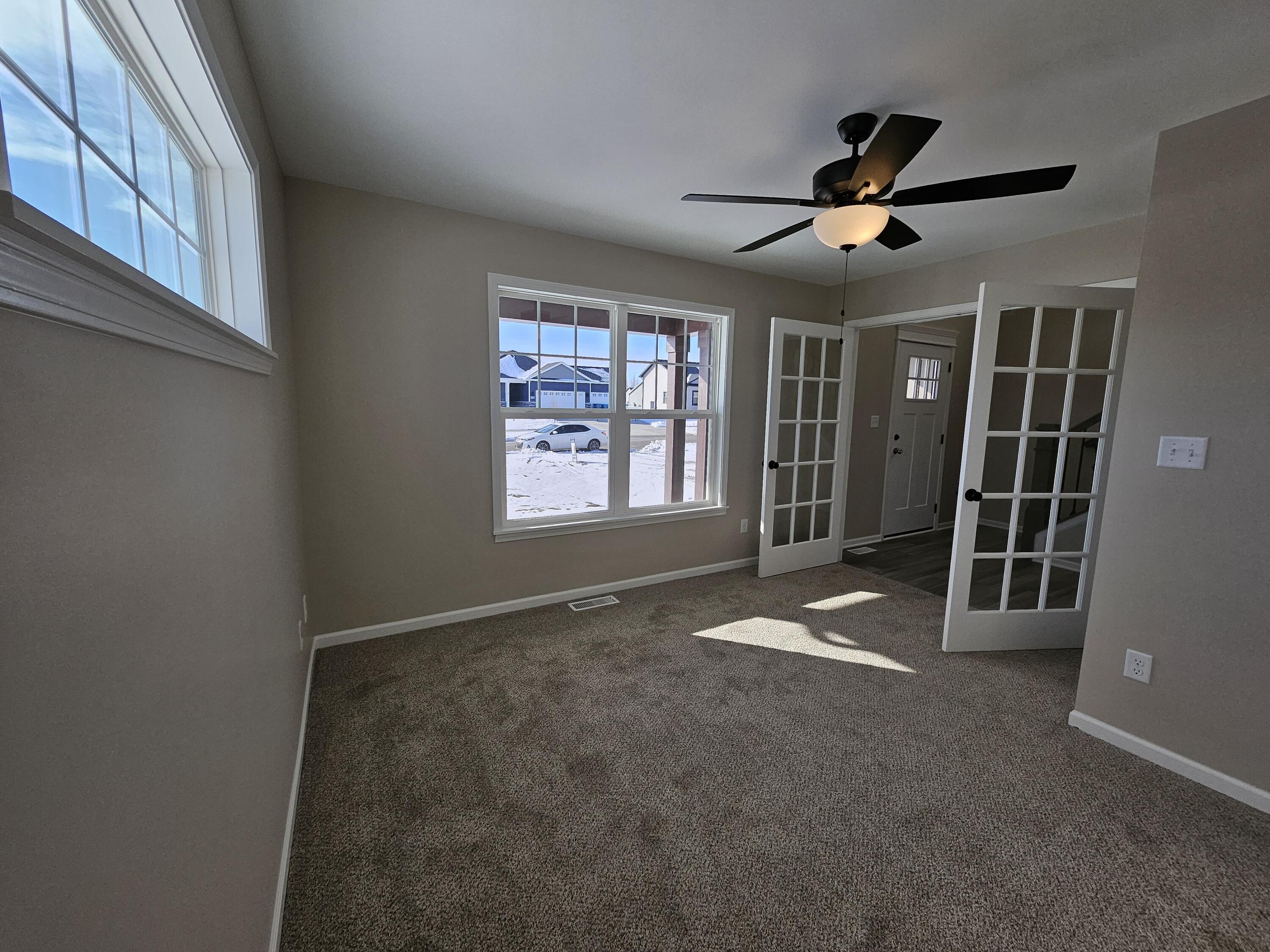 18348 Alexander Avenue Lowell, IN 46356 - Photo 6 of 46 a view of empty room with windows