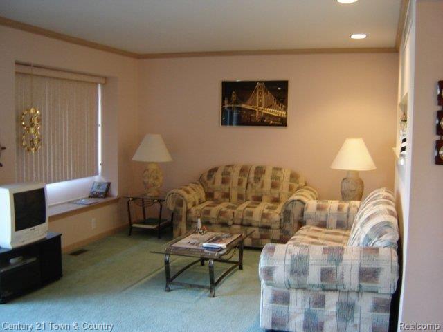 122 Kenyon Road, Unit 33 Algonac, MI 48001 - Photo 4 of 9 Living room w/fireplace