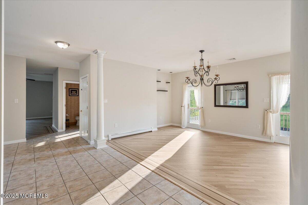 1621 Martin Road Neptune, NJ 07753 - Photo 11 of 54 wooden floor in an empty room with a window