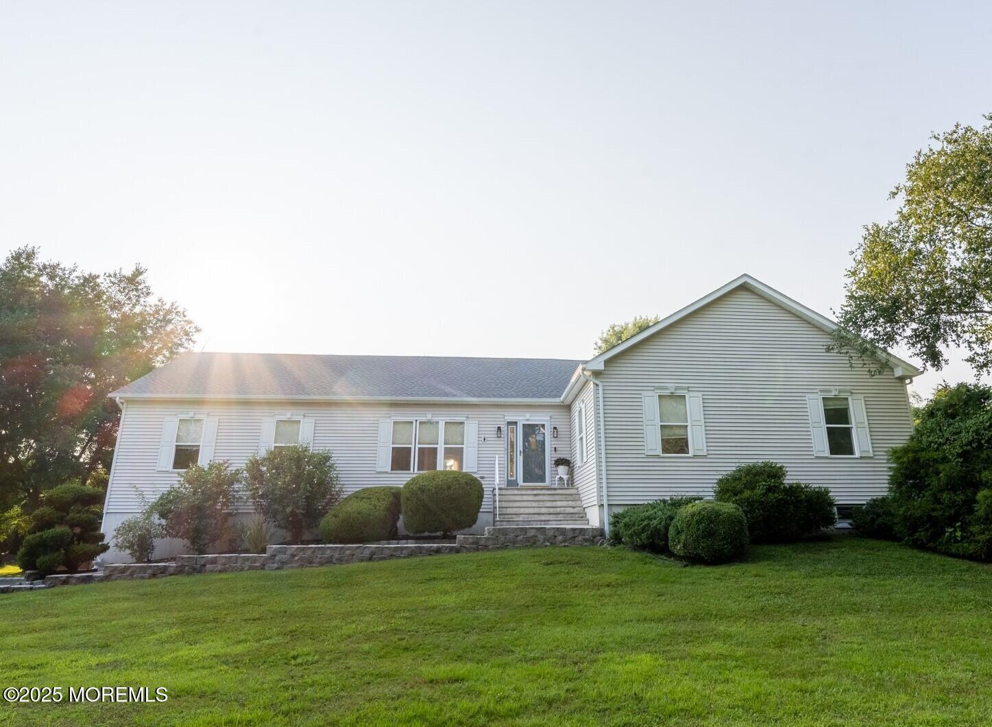1621 Martin Road Neptune, NJ 07753 - Photo 2 of 54 a view of a house with a yard and garage