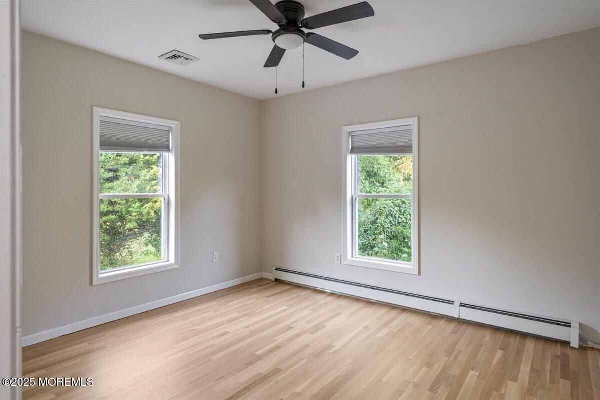 1621 Martin Road Neptune, NJ 07753 - Photo 23 of 54 a view of an empty room with a window