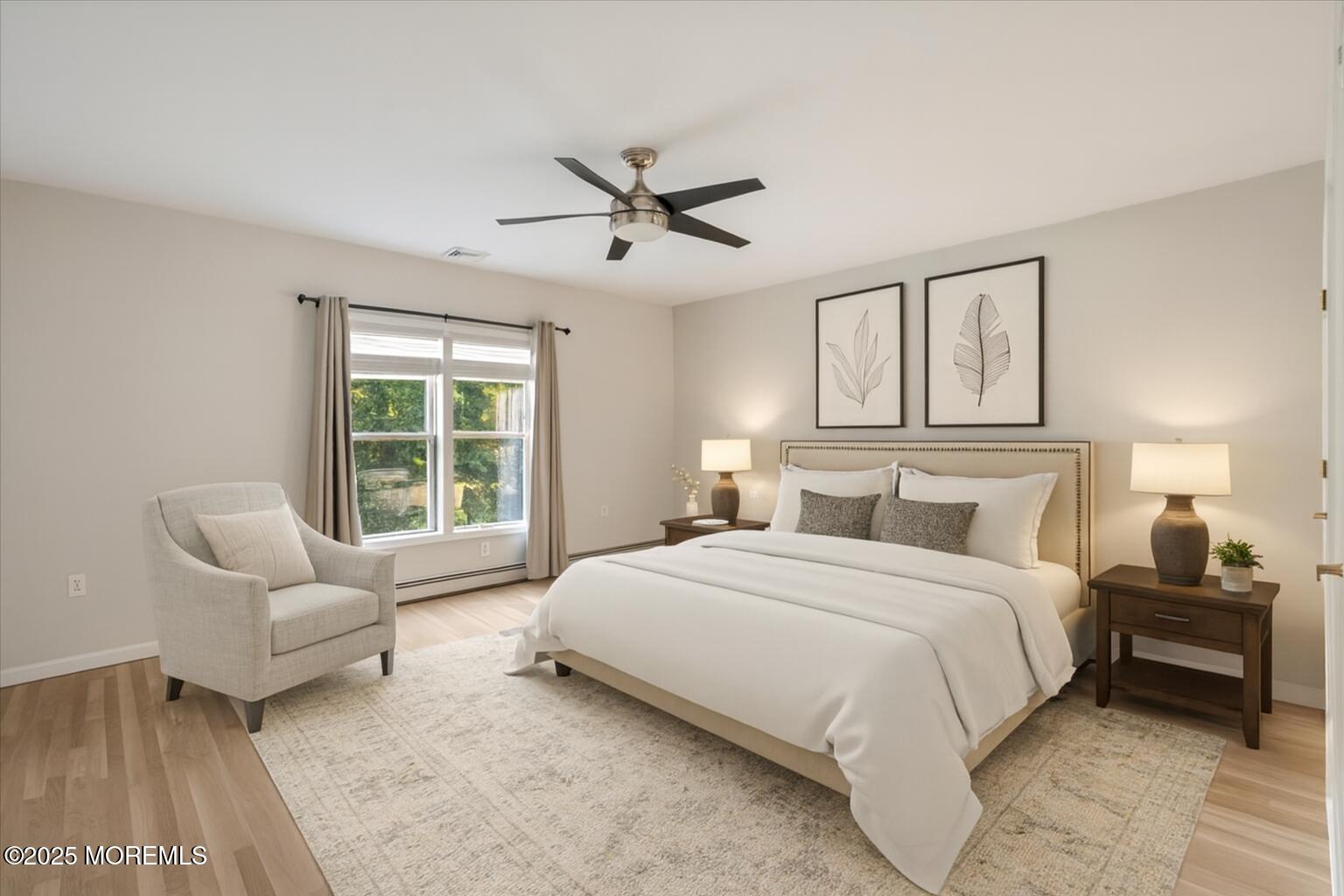 1621 Martin Road Neptune, NJ 07753 - Photo 28 of 54 a bedroom with a bed couch and a window