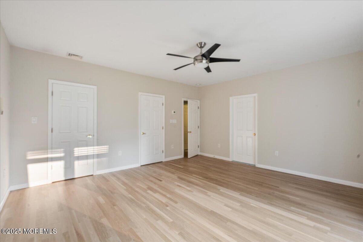 1621 Martin Road Neptune, NJ 07753 - Photo 30 of 54 a big room with wooden floor and windows