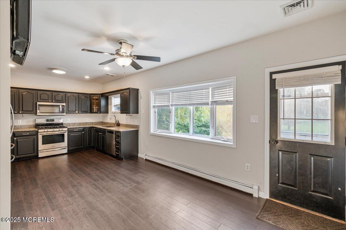 1621 Martin Road Neptune, NJ 07753 - Photo 33 of 54 a view of kitchen with sink a microwave and cabinets