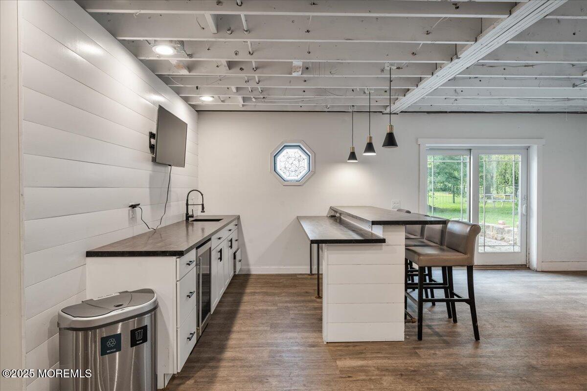 1621 Martin Road Neptune, NJ 07753 - Photo 42 of 54 a kitchen with stainless steel appliances granite countertop a sink a stove and cabinets