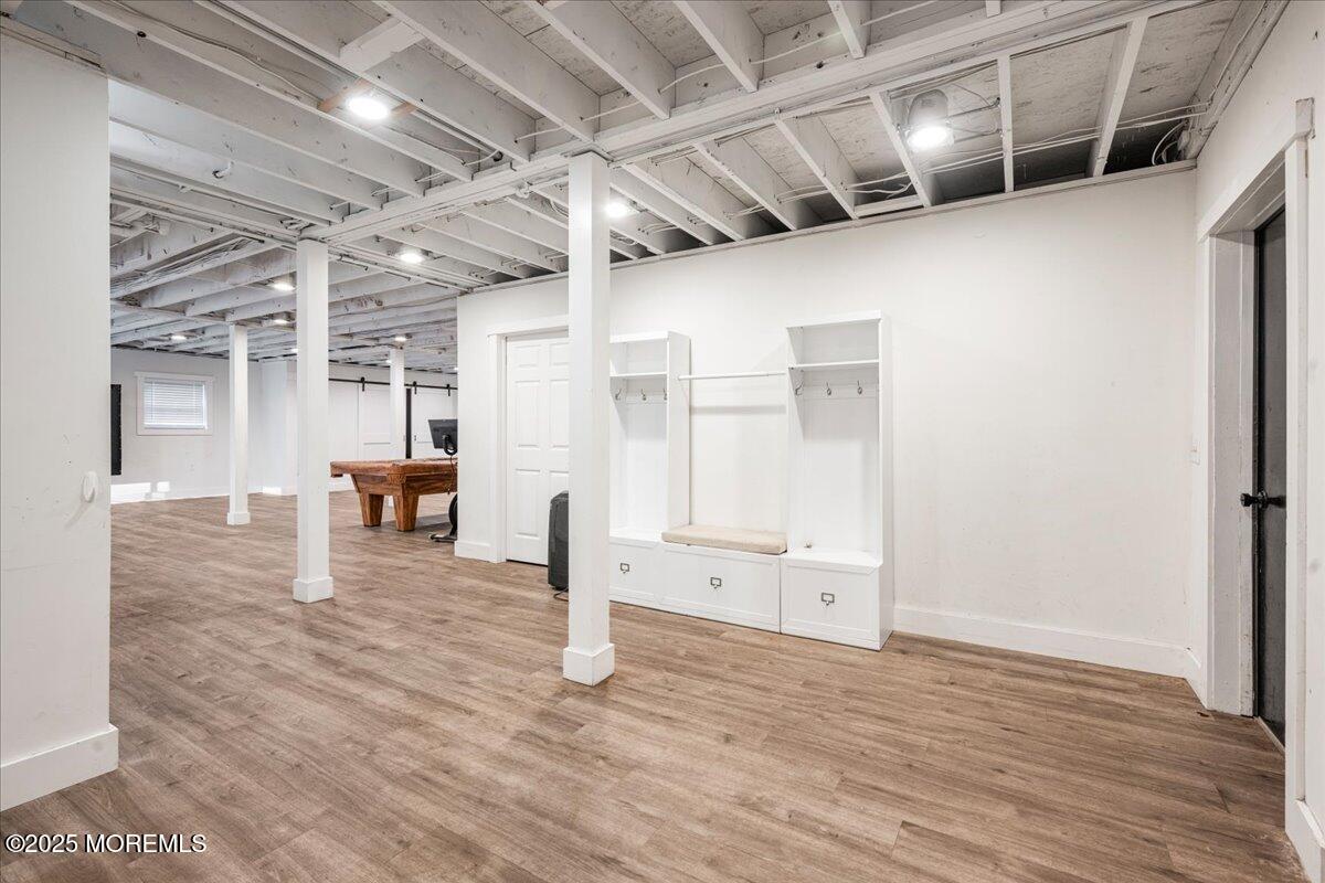 1621 Martin Road Neptune, NJ 07753 - Photo 45 of 54 a view of empty room with wooden floor