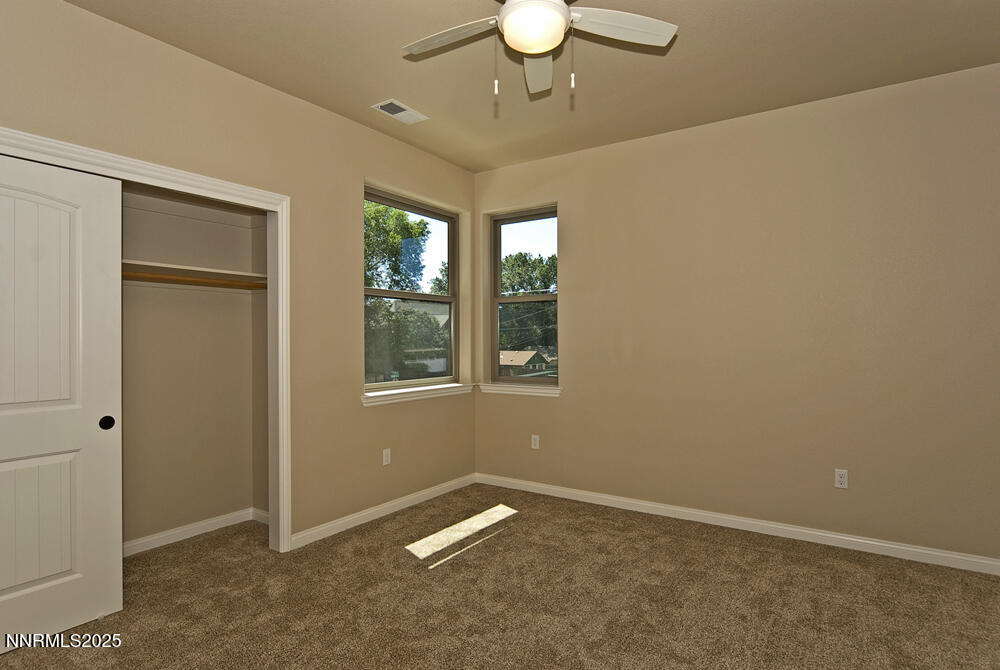 646 Anderson Street Carson City, NV 89701 - Photo 17 of 25 a view of an empty room with a window