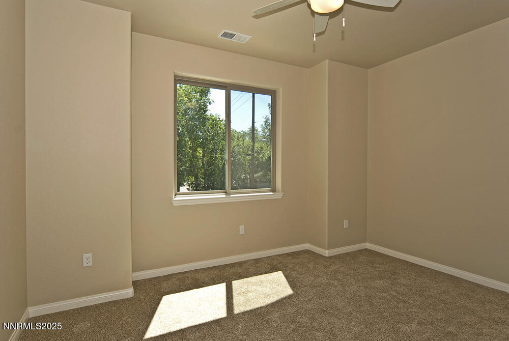 646 Anderson Street Carson City, NV 89701 - Photo 20 of 25 a view of an empty room with a window