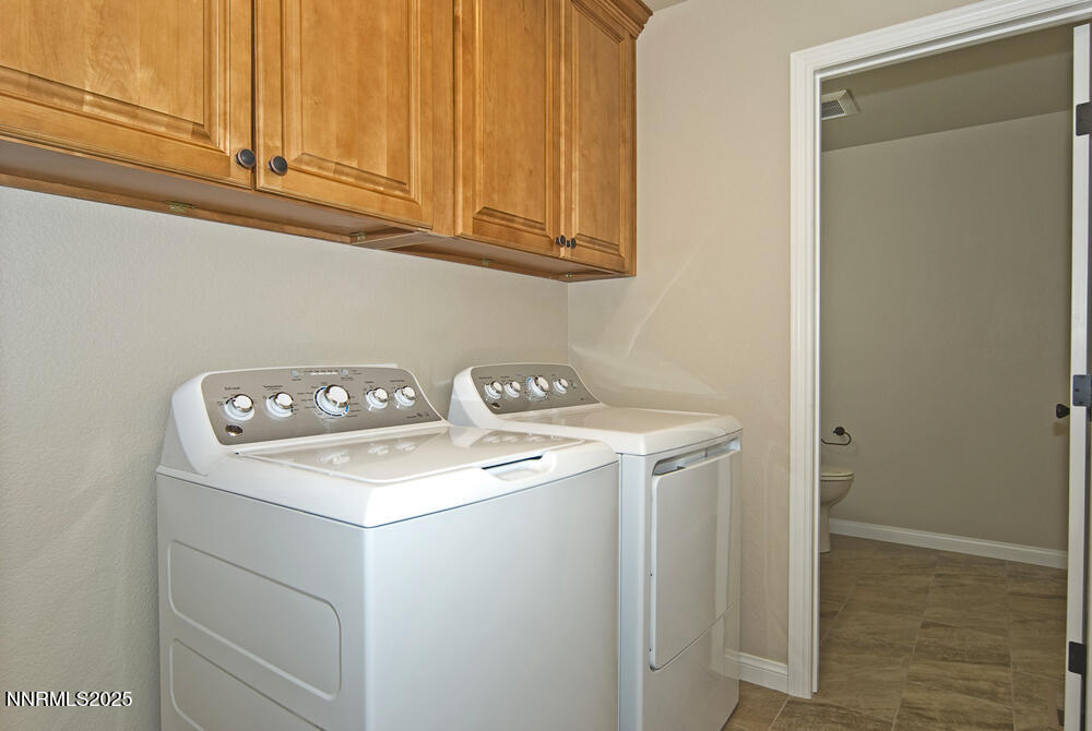 646 Anderson Street Carson City, NV 89701 - Photo 10 of 25 a utility room with dryer and washer
