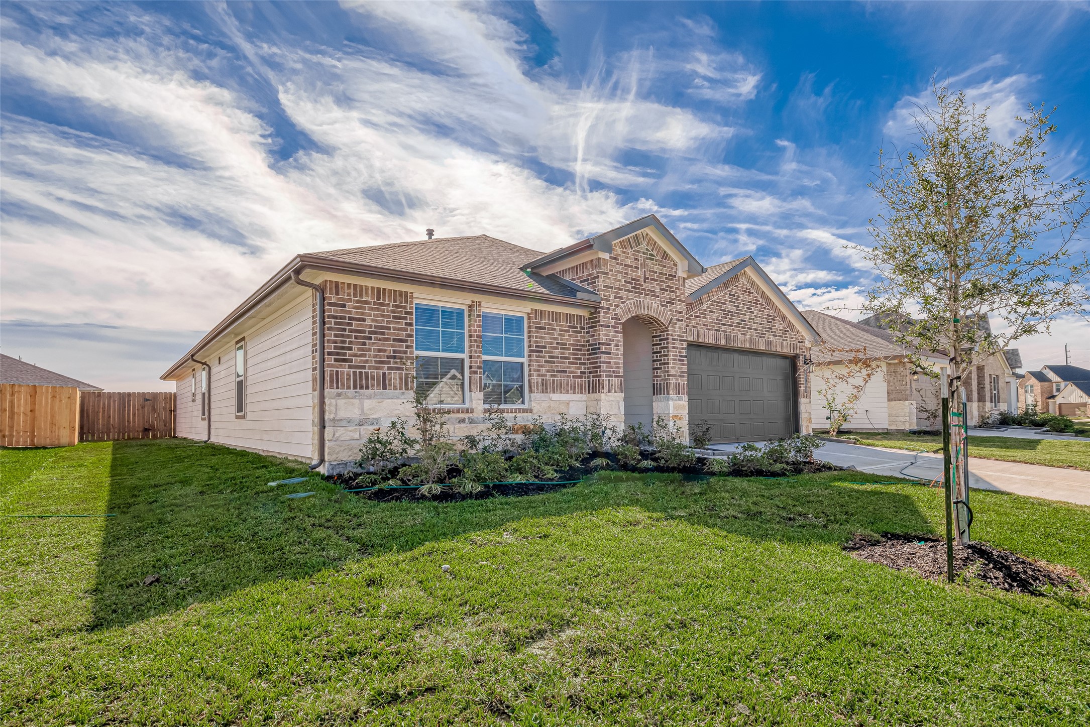 2731 Willow Gulch Way Rosenberg, TX 77469 - Photo 2 of 50 a view of a house with a yard