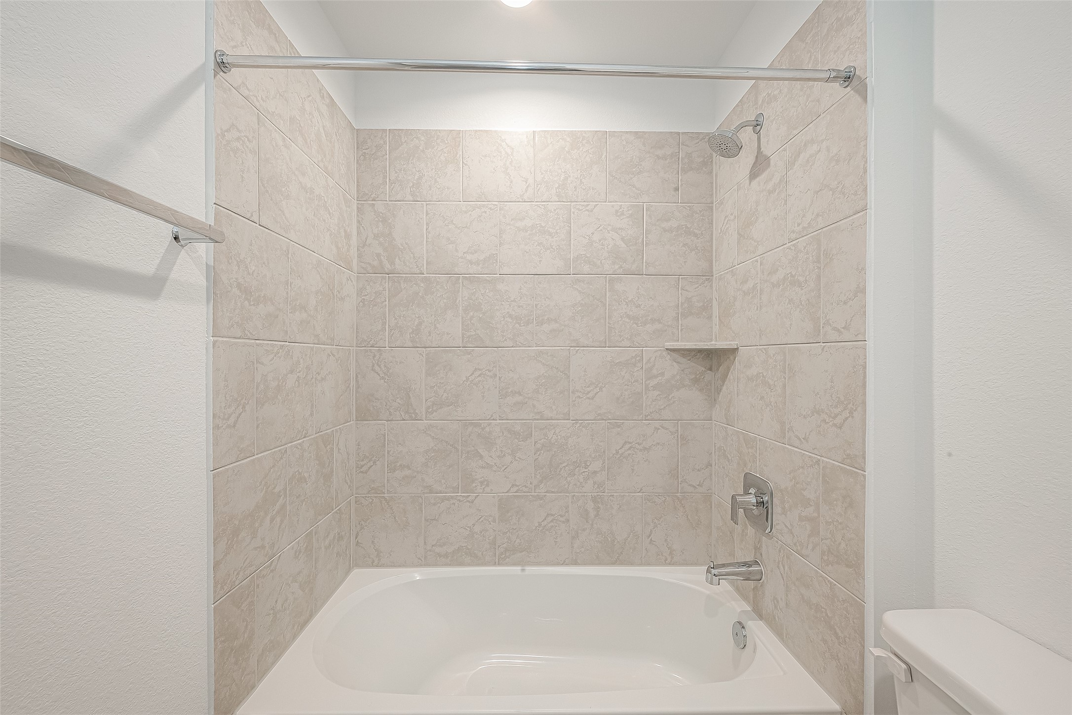 2731 Willow Gulch Way Rosenberg, TX 77469 - Photo 29 of 50 a bathroom with a shower and a bath tub