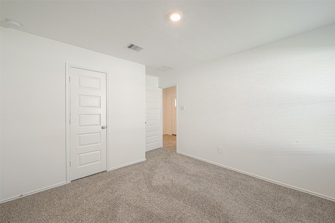 2731 Willow Gulch Way Rosenberg, TX 77469 - Photo 32 of 50 an empty room with closet area