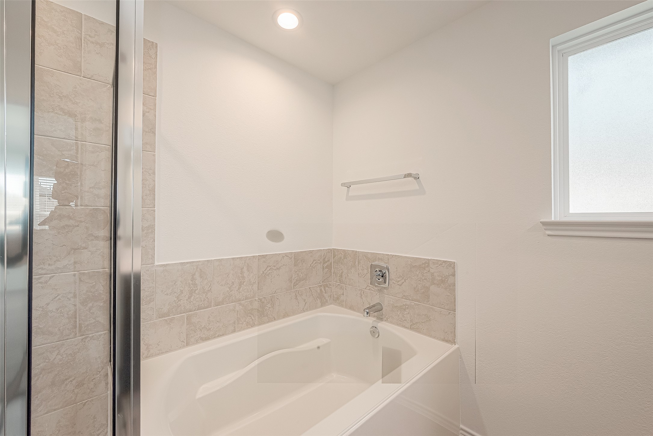 2731 Willow Gulch Way Rosenberg, TX 77469 - Photo 43 of 50 a white bath tub sitting next to a window