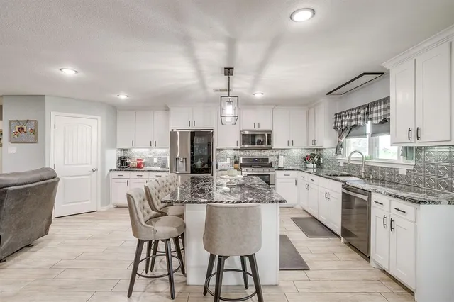 a view of a swimming pool and an ocean view